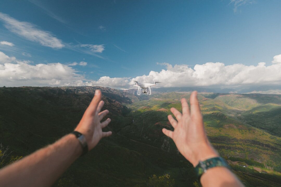 Drone filming aerial video outdoors