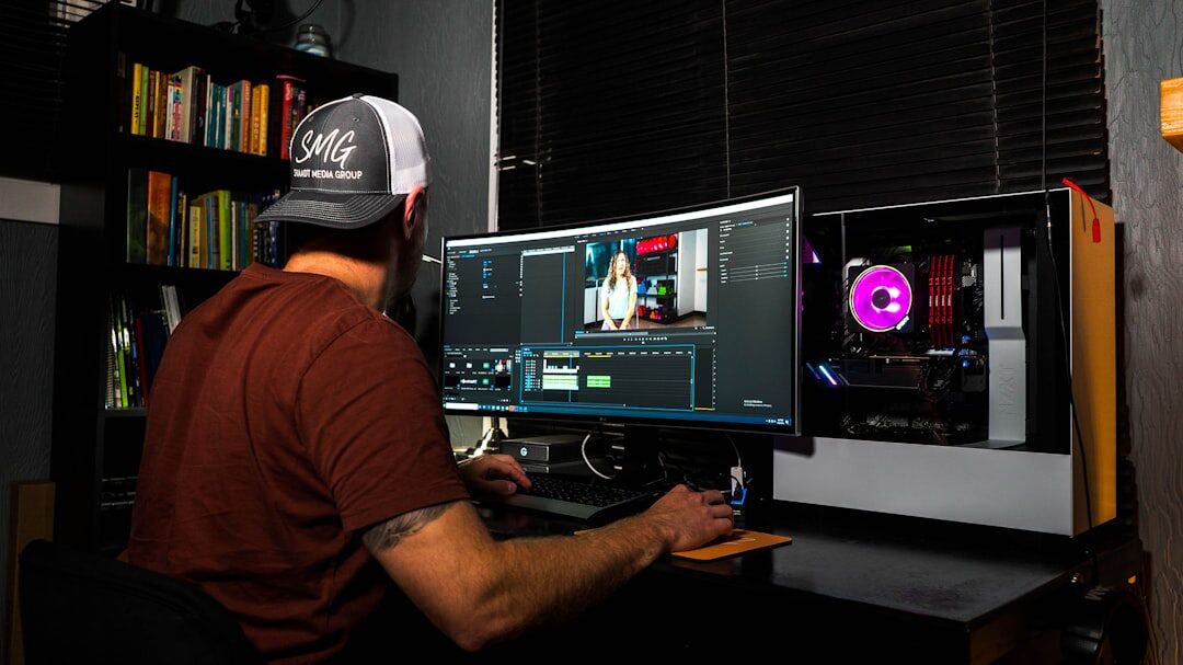 Video editor working on footage at computer